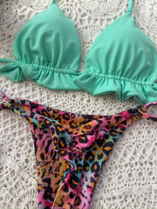 Conjunto ibiza aguamarina, tanga brasilera amarres animal wild